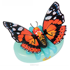 A pretty black and orange butterfly toy.