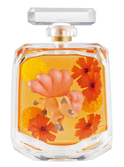 A little crystal bottle filled with bright orange and yellow flowers. The Pokemon vulpix is inside.