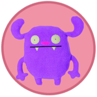 A purple monster with two sharp teeth.