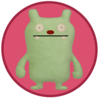 A greenish monster with rounded ears and a red nose.