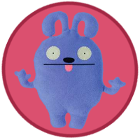 A purple monster with curly ears is sticking it's tongue out at you!