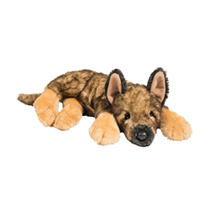 A brown dog laying down with it's ears up.